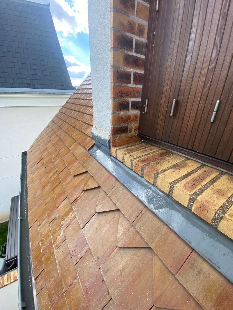 Toiture Sartrouville avant hydrofuge incolore avec mousses